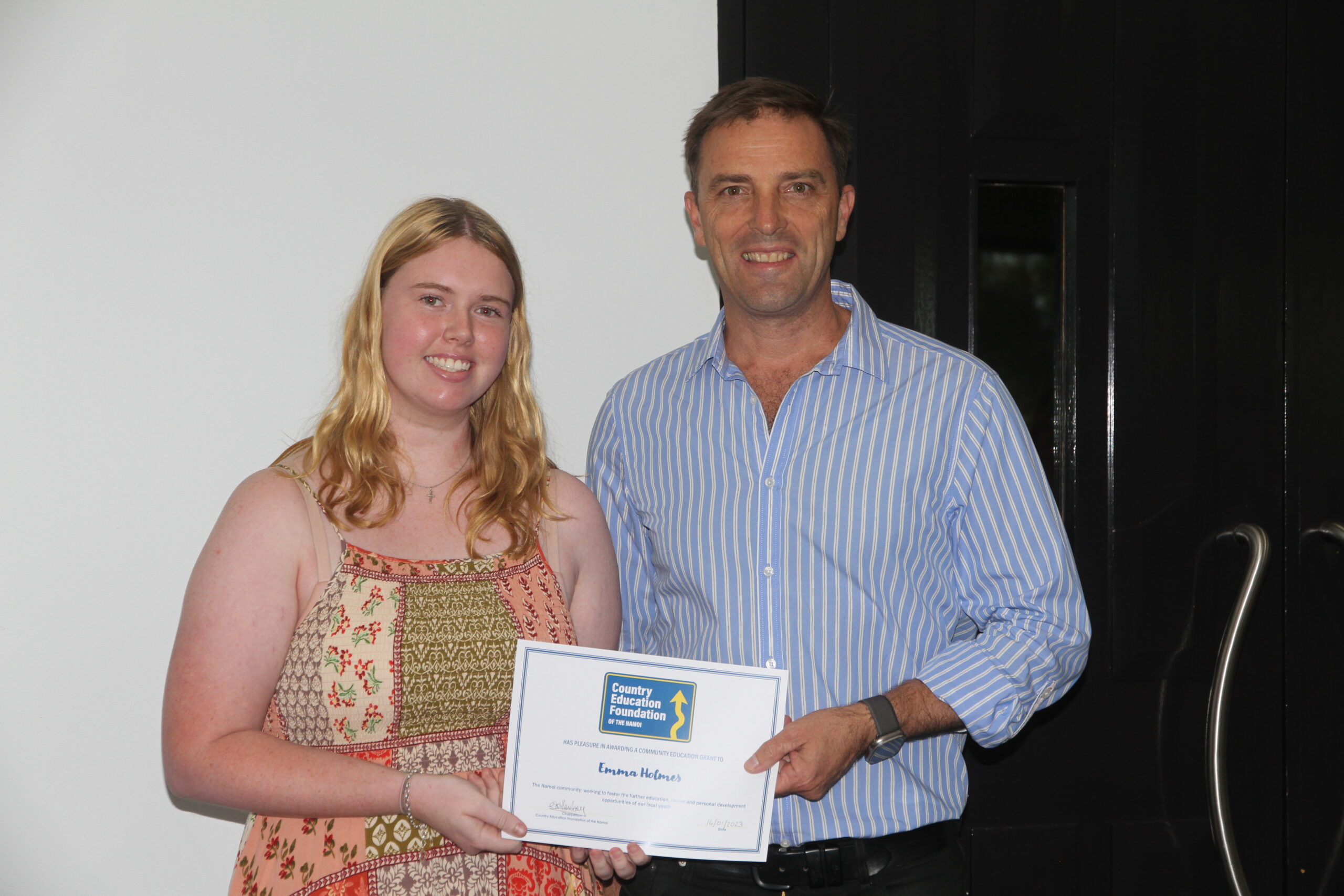 Emma Holmes with deputy mayor Darrell Tiemens.