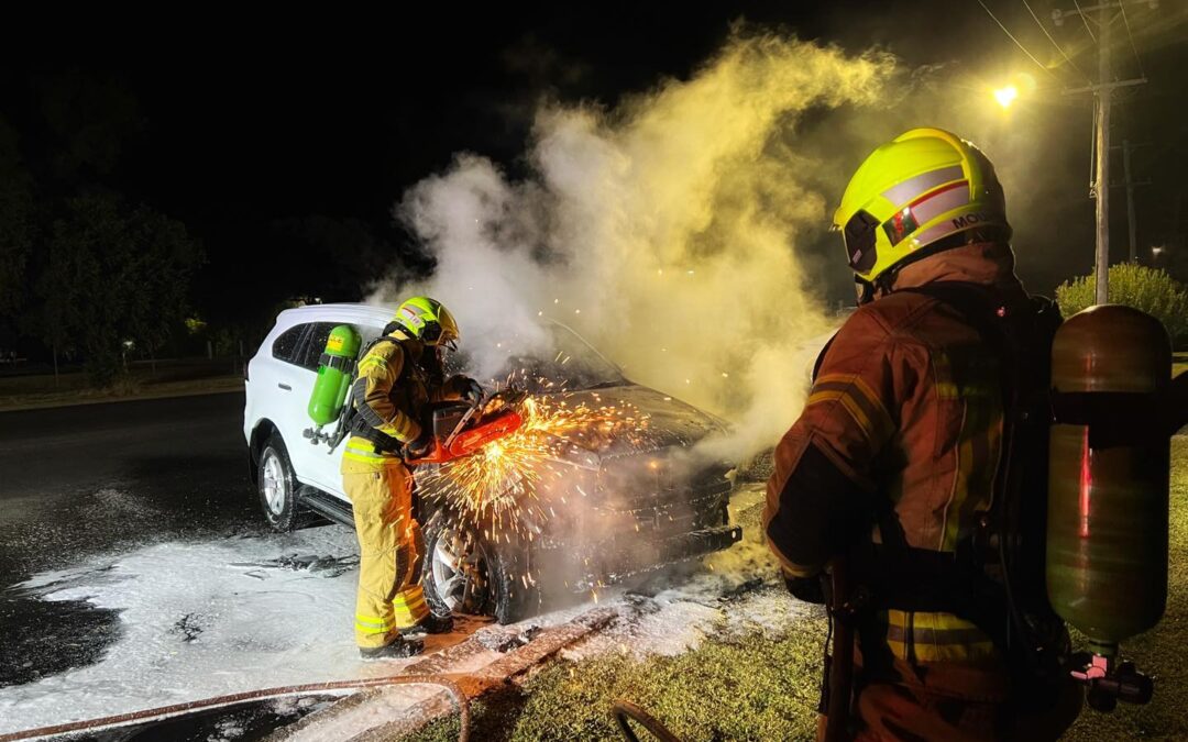 Firefighters extinguish vehicle blaze