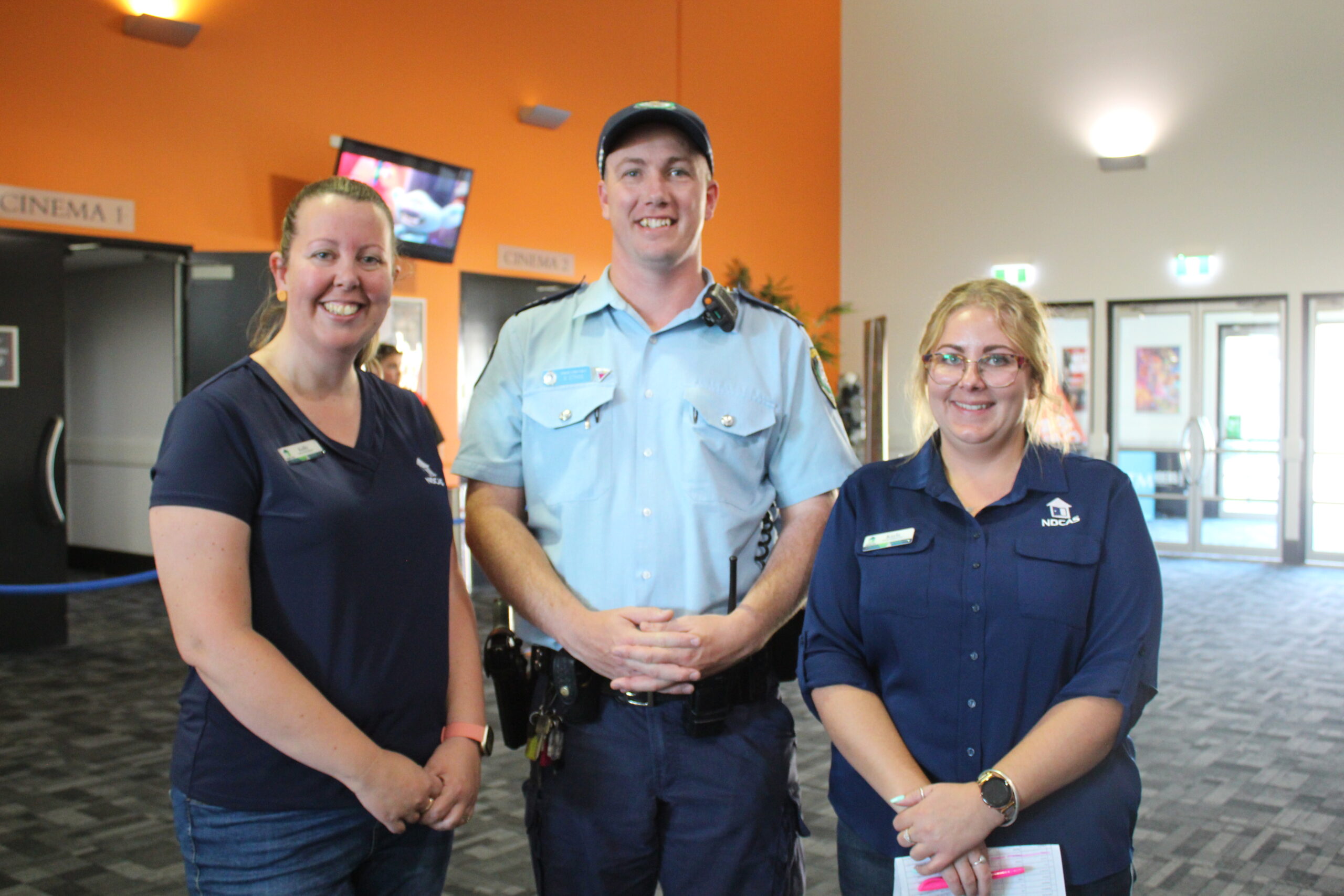 NDCAS team members Kelly Herden and Kayla Nehrkorn, pictured centre, Senior Constable Ben Stride.