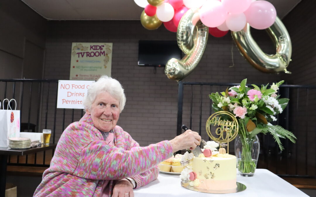 Ellen Eather’s family helps her celebrate her 90th