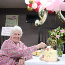 Ellen Eather’s family helps her celebrate her 90th