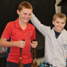 Owen Rixon loses his locks to help classmate Liam