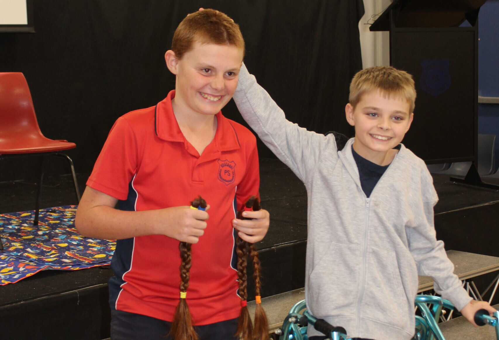 Owen Rixon loses his locks to help classmate Liam