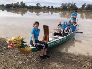Namoi Dragons members with the club’s new tens champion series boat. Pictured are Joan O’Neill, Nicole Bogdanoff, Sumudu Bandarage, Jane Longstaff, Karen Kirkby, Louise Stewart, Sharon Borchardt, Gerard Lonergan and Kirk Harvey.
