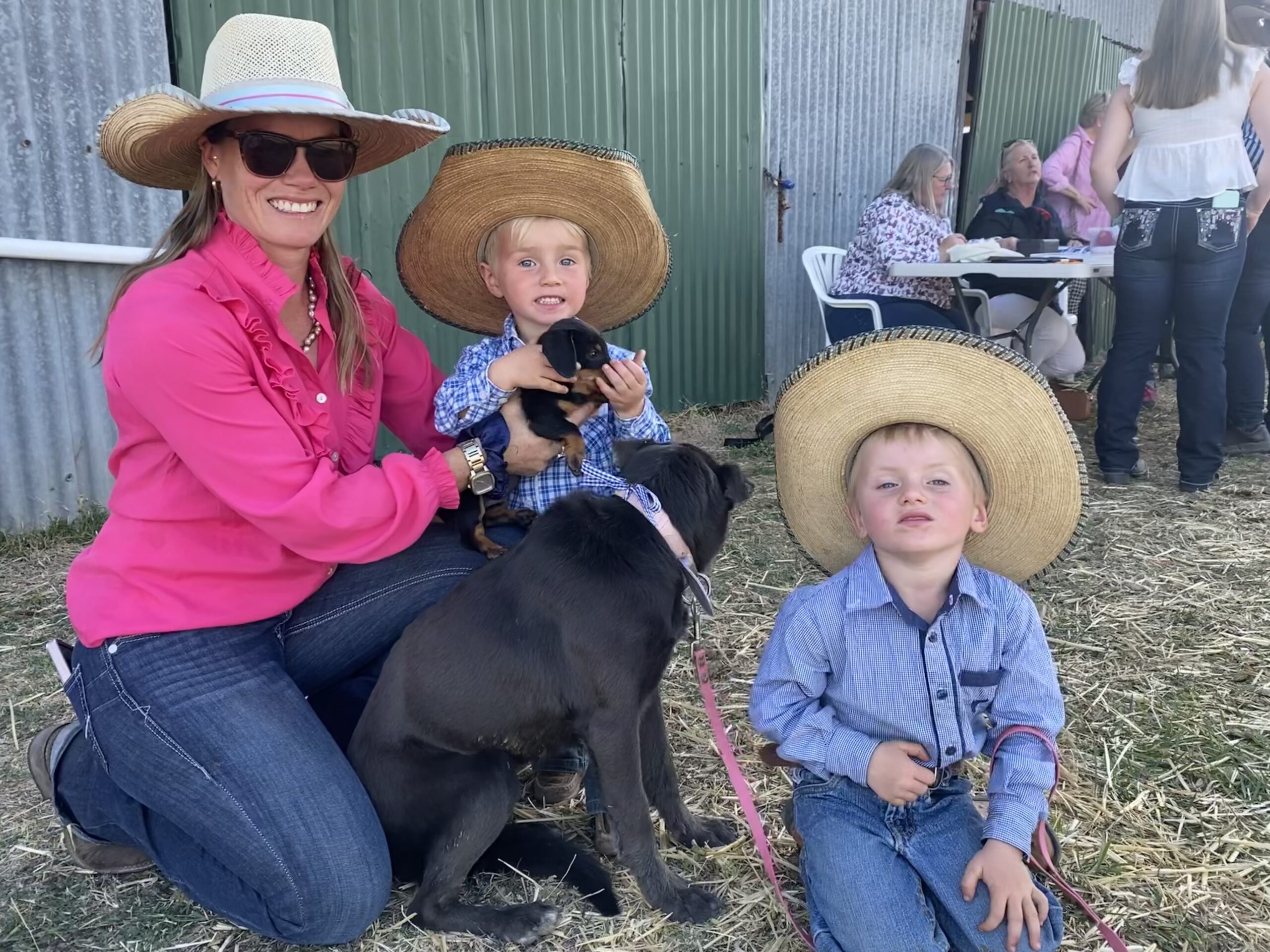 left, pet show: April Legett with sons Eli and Austin Leggett- Mortimer and pet dog sugar and new pup, who is yet to be named at is looking for a new home.