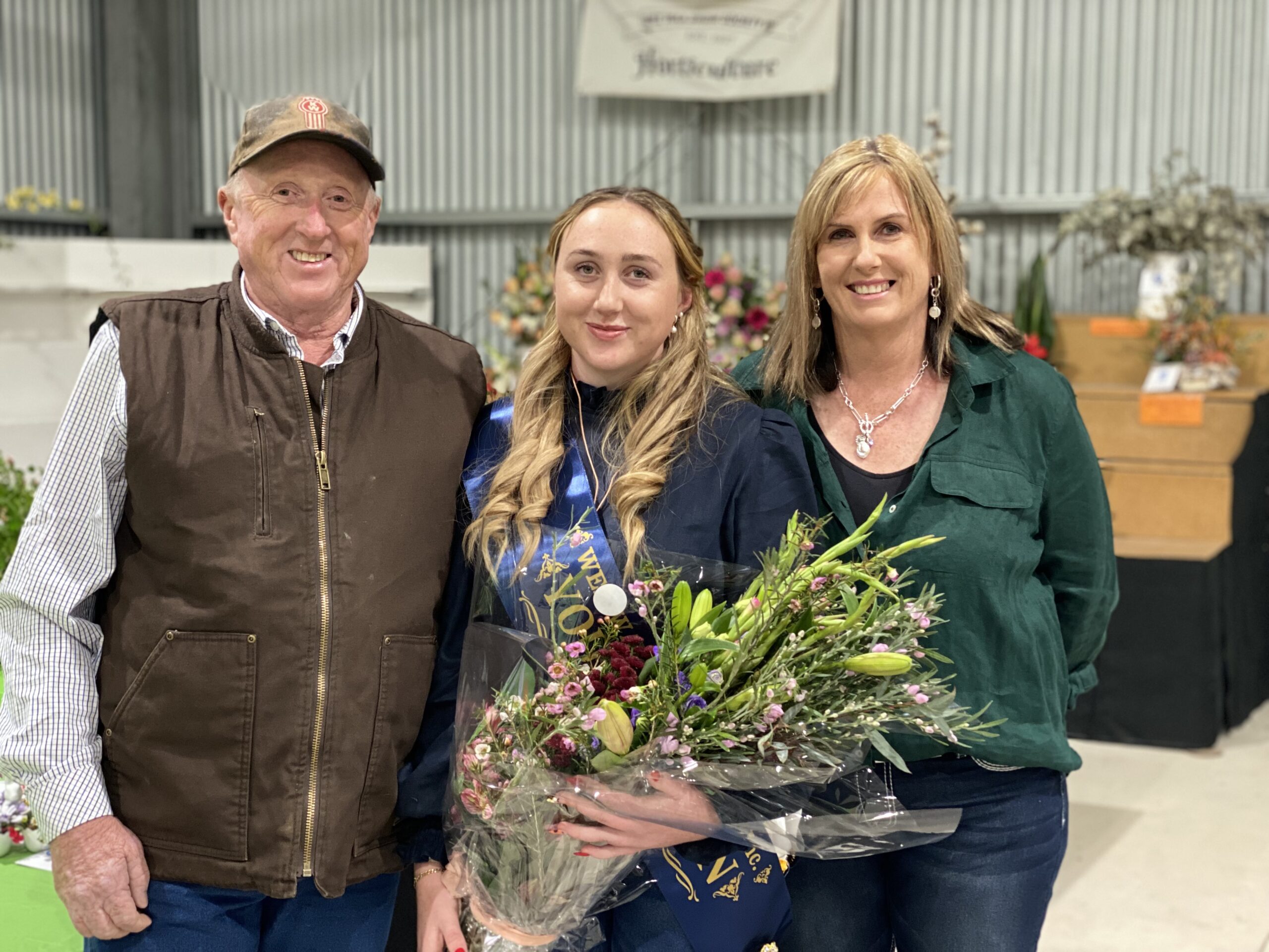 2023 senior Young Woman competition winner Montana Winter with her parents Steve and Paula at the Wee Waa Show on Friday night.