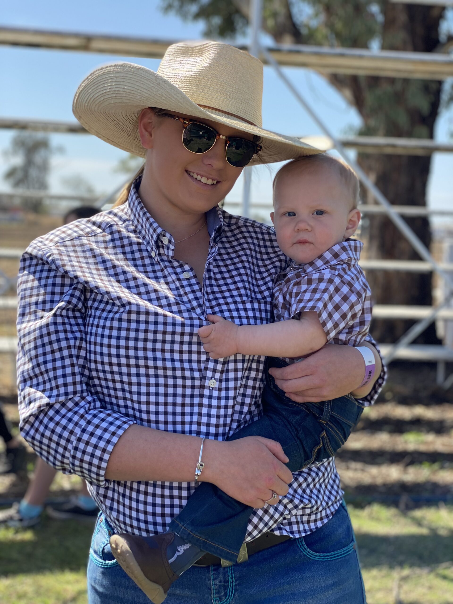 Klowie Morley holding nine-month-old Greyson Morley.