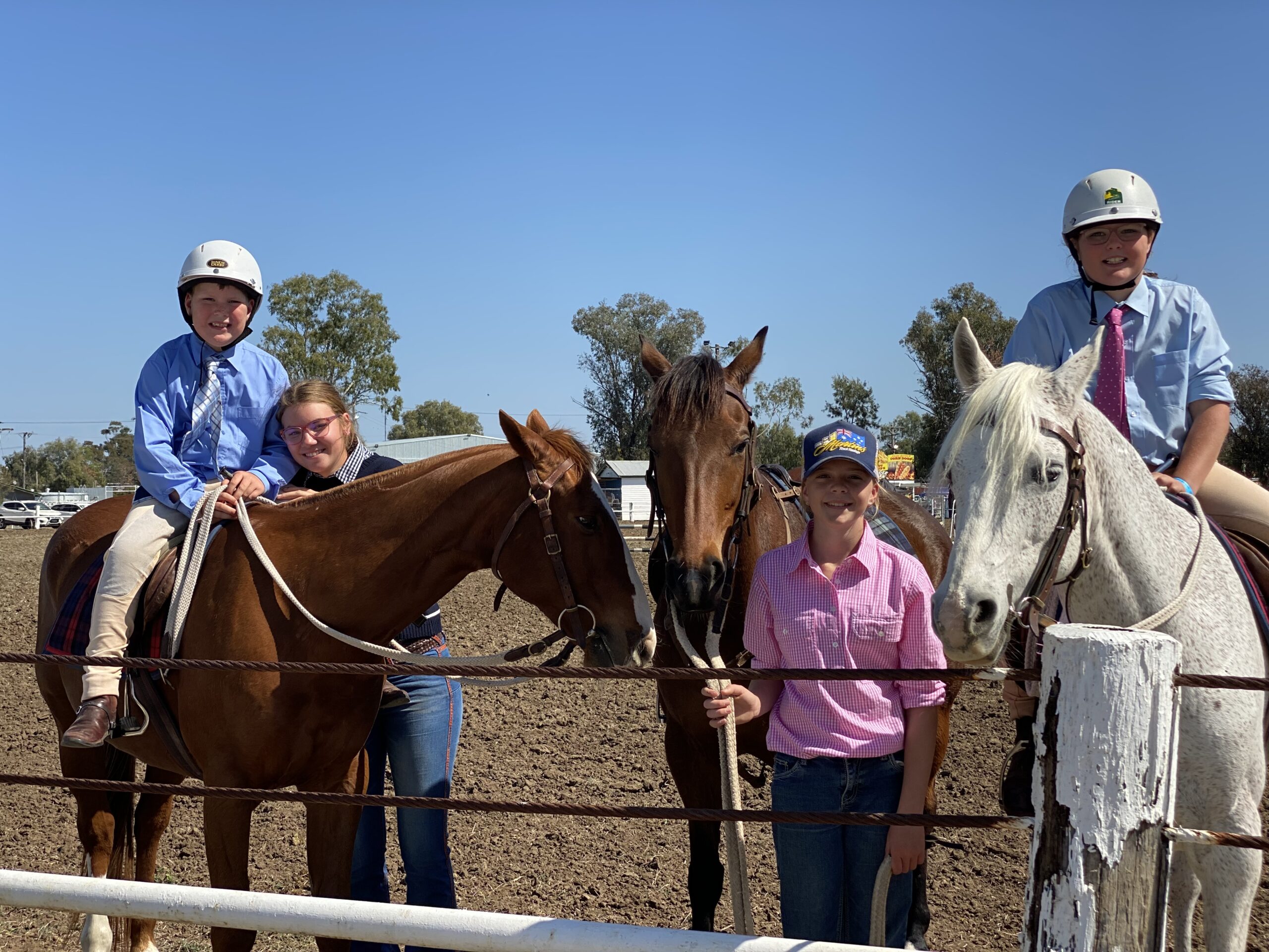 Angus Booby riding Ned, Piper Williams, Alexa Gordon holding Sistaah and Lucy Booby riding Alana.