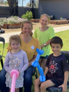 Back, Michelle and Belinda Smith, front Sophie Borodzicz and Mark Anderson enjoying the balloon creation stand at NVCS fete-style event held on Saturday to mark the school’s 40th anniversary.