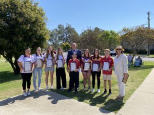 RECOGNITION FOR NIAS ATHLETES: Mackenzie Knox, Haylee Turner, Juliet Maxwell, Megan Crutcher, Edward Bennett, mayor Ron Campbell (back), Ashley Hanslow, Lillie Harvey, Lennon Simmonds and NIAS chief executive officer Shona Eichorn.