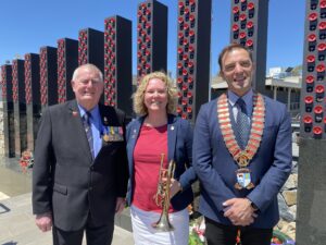 Narrabri RSL sub-branch president Gary Mason OAM, left, with bugler at the Narrabri Remembrance Day ceremony, Sarah Smith, and Narrabri Shire mayor Darrell Tiemens who delivered the prayer for the fallen.