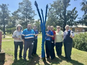 Wee Waa health service manager Yve Connett, maintenance manager Noel Woodyard, administration officer Kristy Schwager, administration officer Mary Jones, nurse Marika Sadler, HealthShare patient support Deidre Dubbelde, security officer Andrea Webb supporting the Blue Tree Project, a successful mental health initiative.
