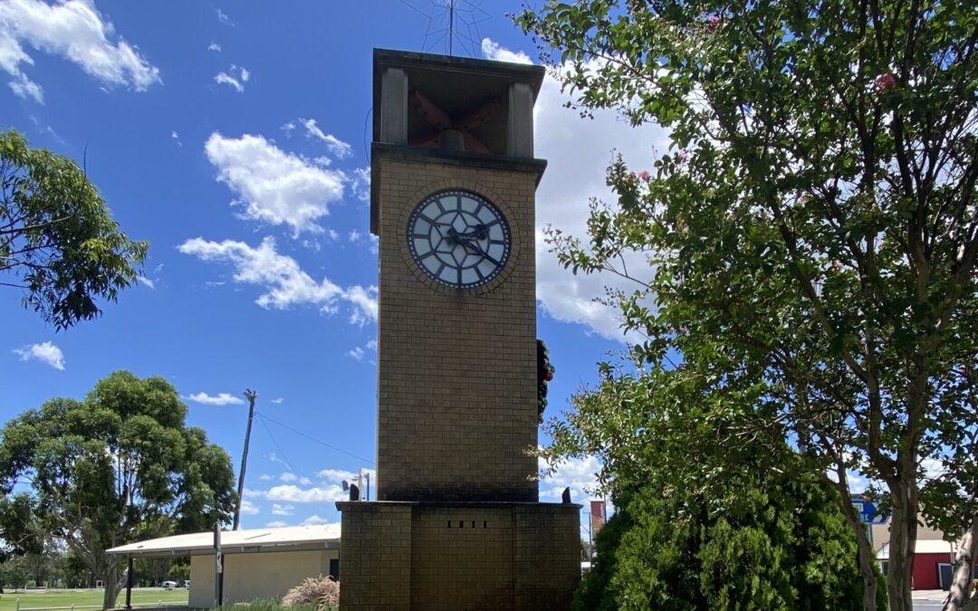 Why does the sound of the town clock chime more audibly at night compared to during the day?
