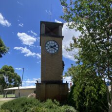Why does the sound of the town clock chime more audibly at night compared to during the day?