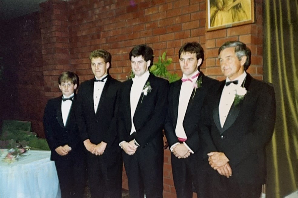 John Grellman, forefront, with his sons, from left, Ben, Ian, David and Tim.
