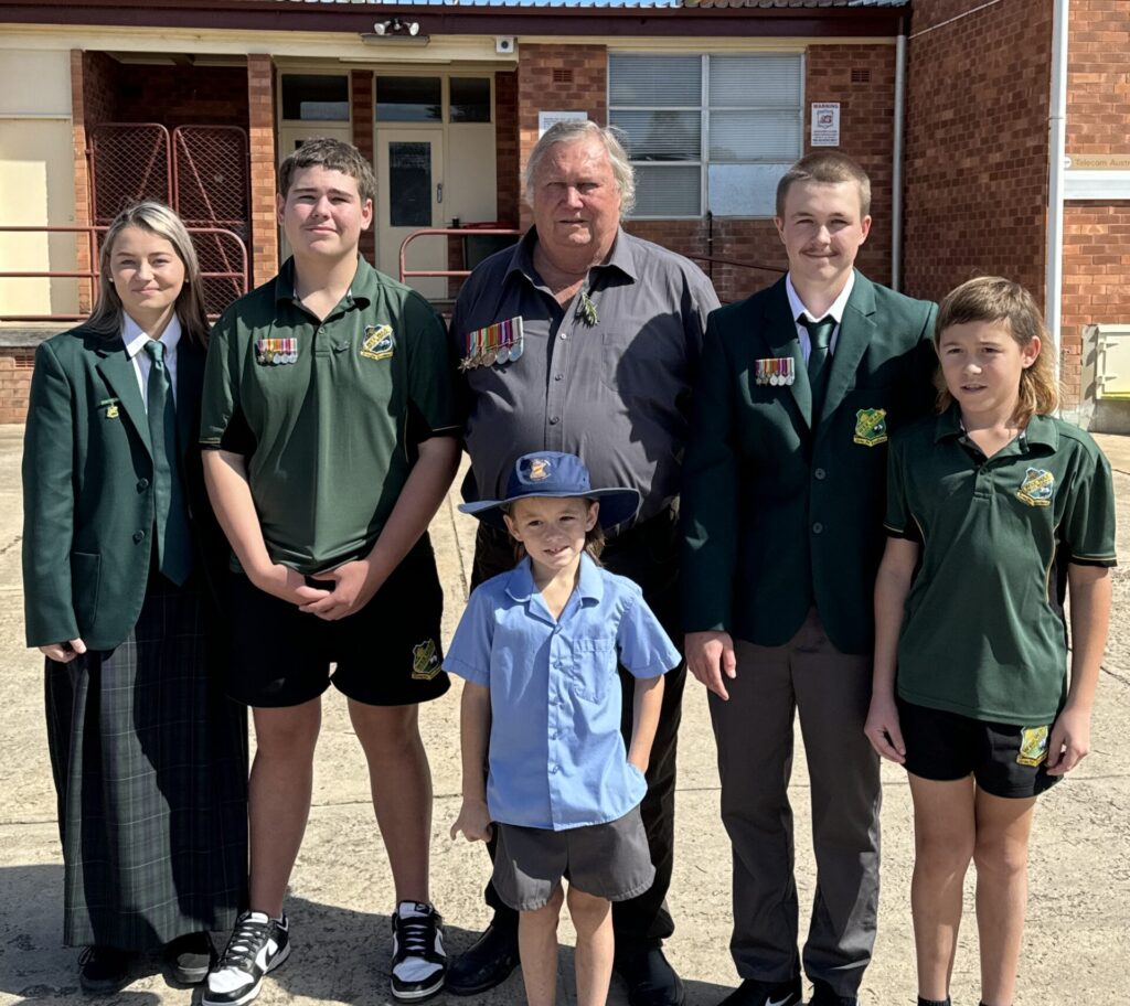 Every year members of the Humphries family attend the Anzac Day service, a special moment this year involved the WWHS leadership team, including Chelsea and Jackson Humphries, delivering a speech about their late great-grandfather, World War II Veteran - Gunner George Humphries. Pictured centre is George’s son Graham before the march with grandchildren, Chelsea, Mason, Jackson, Chase and Van (front) Humphries. Family members also attended the dawn service.