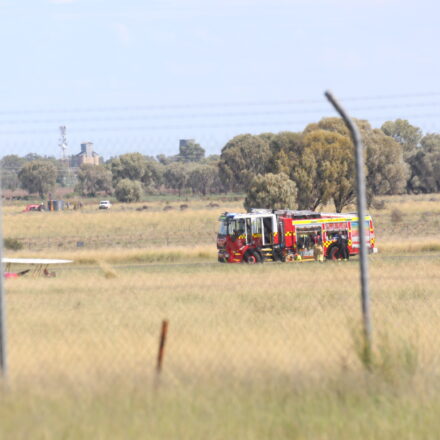 Emergency services respond to light plane crash at airport