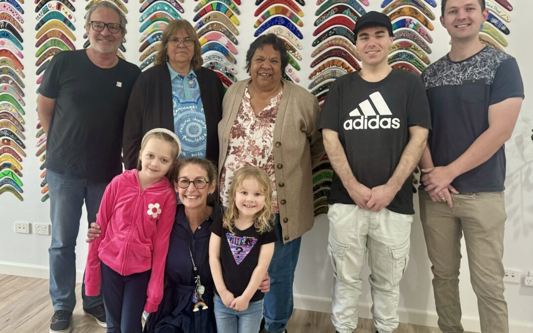 Colourful boomerangs return to Wee Waa Community Arts and Cultural Centre wall