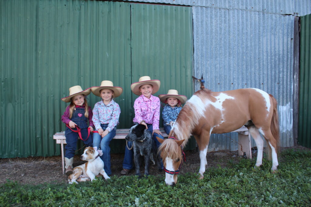 The Haverhoek family waiting for the pet show competition to start, Bree-arli with Dotti the dog, Matilda (who entered Rosie the rabbit, absent from photo), Gracie with Lloyd the dog and Evie with Toby-Joe the horse.