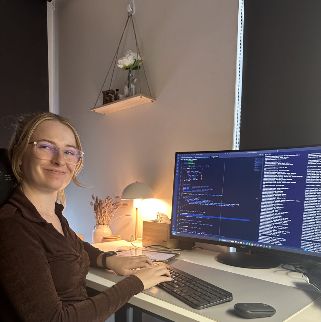 Eliza Dampney working on a lab exercise for one of her courses where she is writing code to sort through and filter student data.