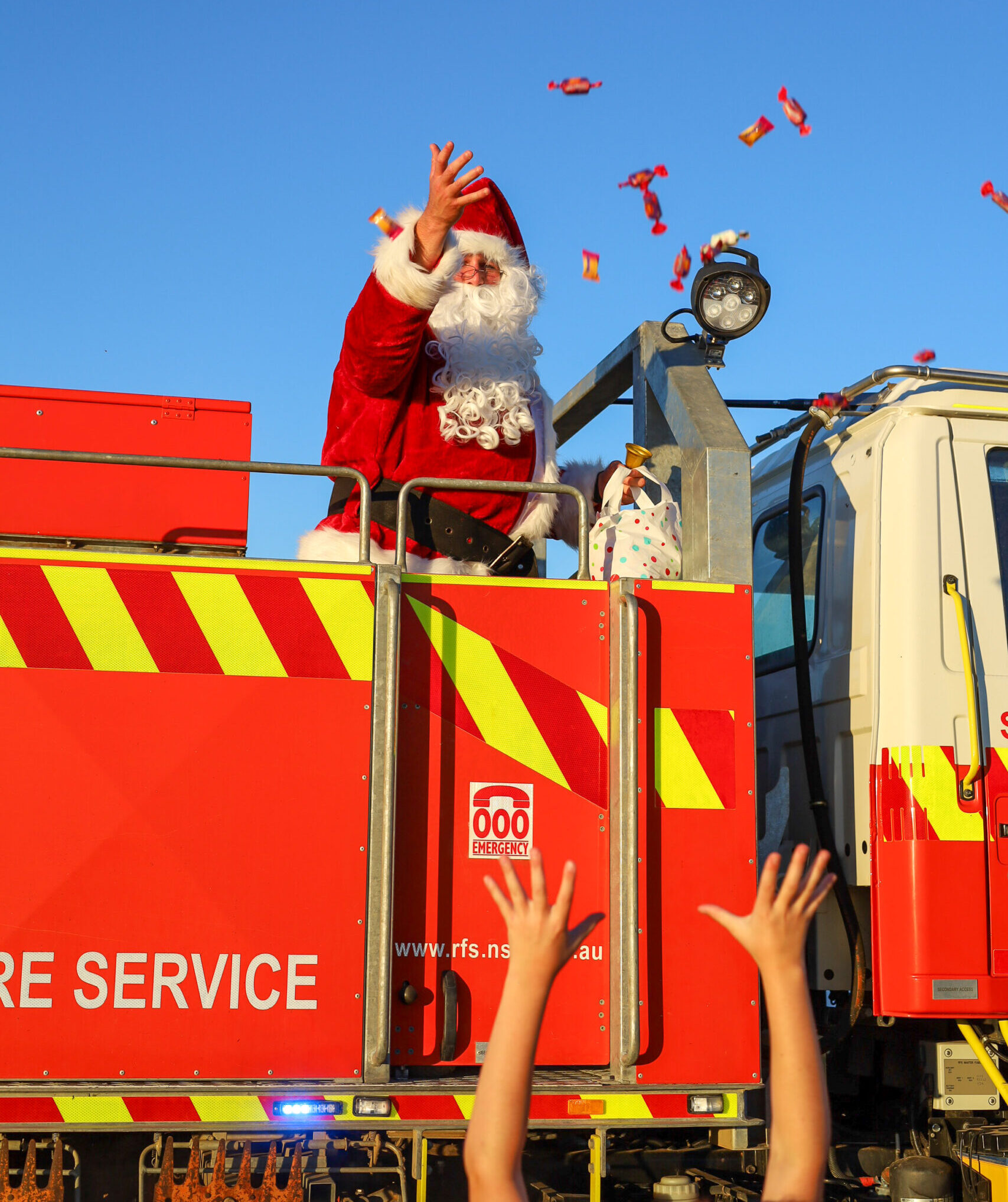 Santa rolled into Spring Plains in his signature style, perched on top of the RFS Spring Plains West truck with the sirens flashing sirens. Local children gave the jolly man in red a very warm welcome, waving and bursting with excitement as he generously showered them with sweet treats.