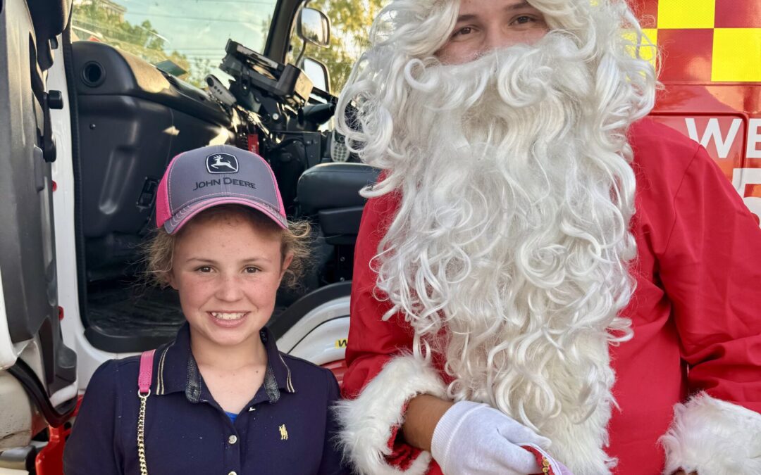Santa stops at Wee Waa Christmas Street Festival