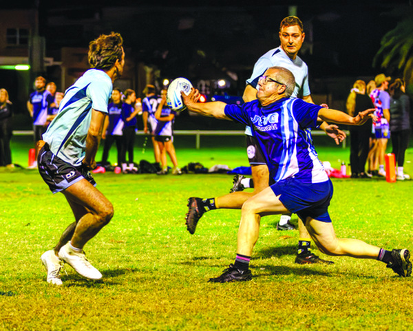 Bernard Gabbott knocking down a try-scoring pass attempt from One Hit Wonders. Photo: Bruce Malcolm.